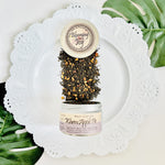 indulge in the comforting flavors of grandma's apple pie with our Warm Apple Pie Black Tea. Crafted with apple pieces, cinnamon, cloves, and orange peels, this high-caffeine blend offers a rich and aromatic experience.