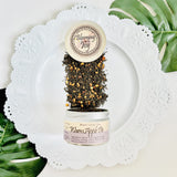indulge in the comforting flavors of grandma's apple pie with our Warm Apple Pie Black Tea. Crafted with apple pieces, cinnamon, cloves, and orange peels, this high-caffeine blend offers a rich and aromatic experience.